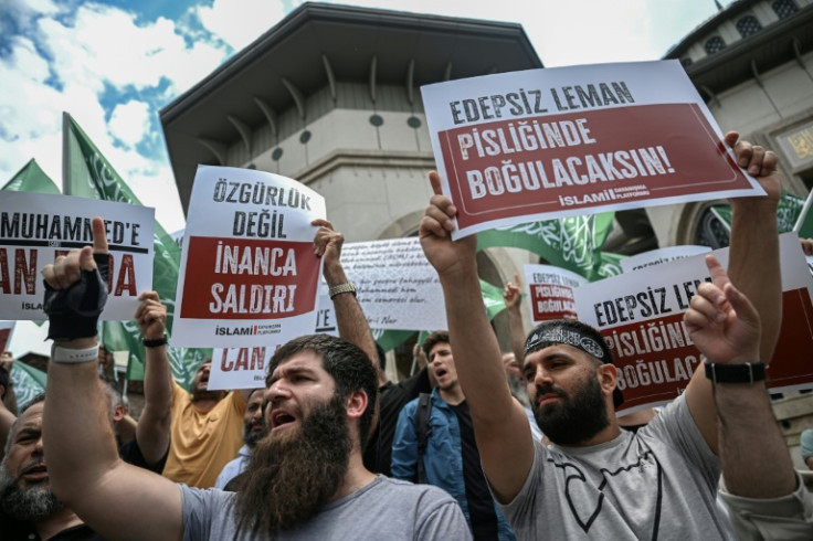 Angry protesters rallied again in central Istanbul, shouting threats following allegations that Leman satirical magazine had published a cartoon of the Prophet Mohammed, holding signs reading: 'Immoral LeMan, you will drown in your own filth'