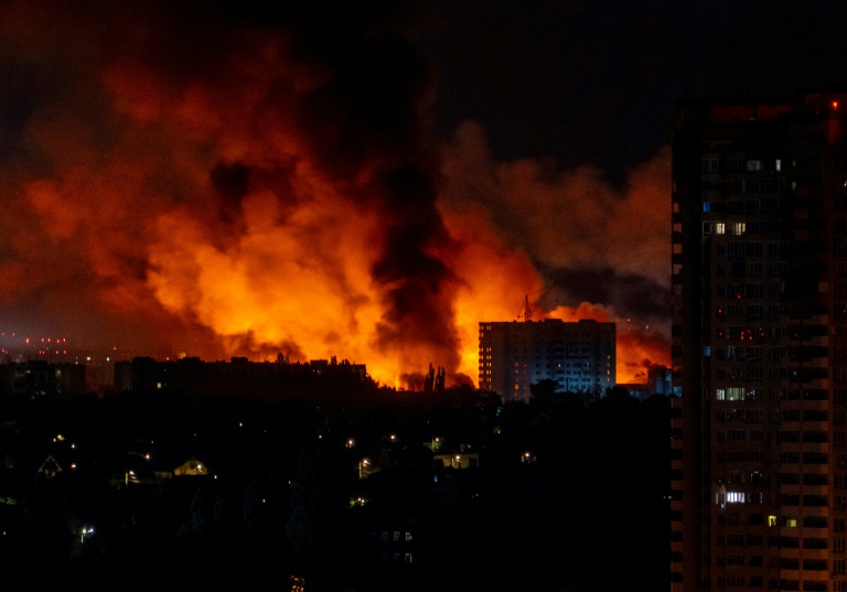 https://d.ibtimes.com/en/full/4608953/flames-smoke-billow-buildings-during-mass-russian-drones-missile-strike-ukraines-capital.jpg