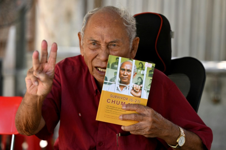Chum Mey, one of just a handful of S-21 survivors who now sells his memoirs in the prison compound where he says he was beaten, electrocuted and starved