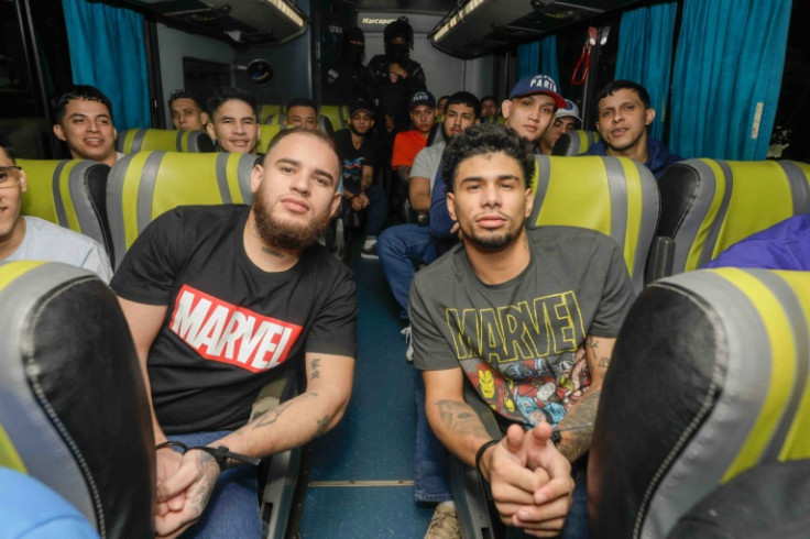 A photo released by the Salvadoran presidency of some of the men headed back home to Venezuela