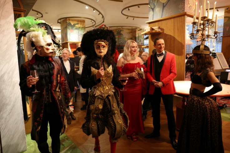 At the evening staged in Manhattan's new Printemps luxury emporium, which opened on Wall Street on March 1, guests and performers alike donned velvet waistcoats, silky corsets, feathered headdresses and powdery makeup
