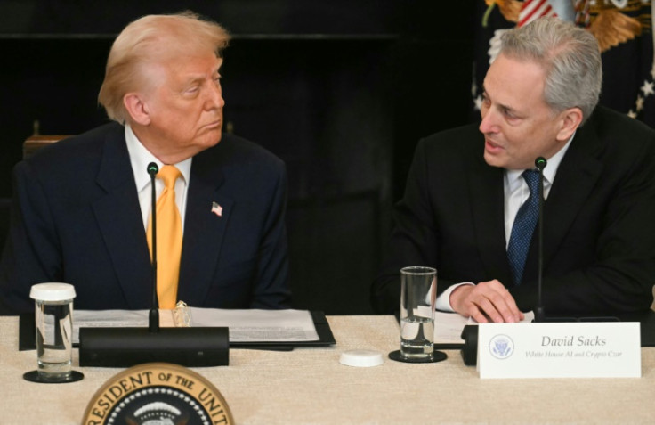 US President Donald Trump listen to White House AI and Crypto Czar David Sacks speak during a White House crypto summit in March