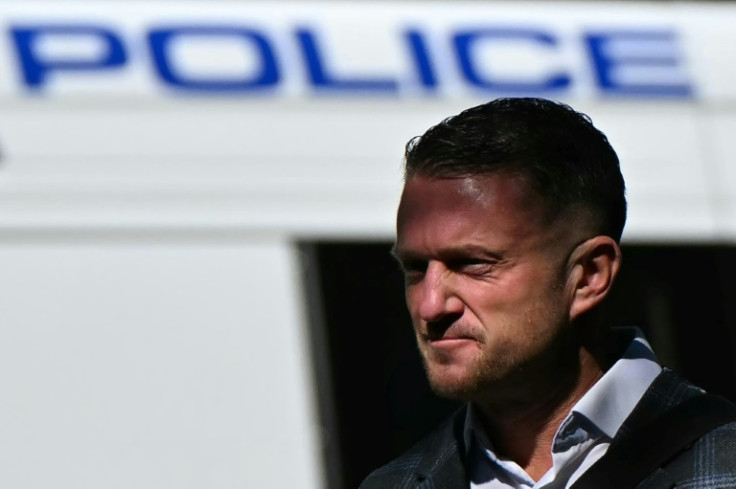 British far-right activist Tommy Robinson, whose real name is Stephen Yaxley-Lennon, arrives outside Southwark Crown court on July 3, 2025, charged with "harassment" of two journalists.