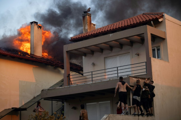 Several homes were ablaze as winds pushed fires through properties