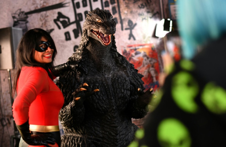 A "Godzilla" fan poses at Comic-Con in San Diego, California on July 26, 2025