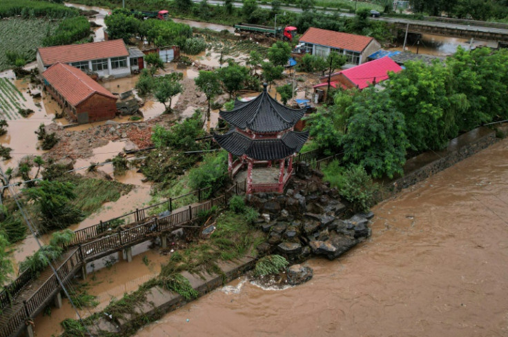 In Beijing, over 3,000 people in suburban Miyun district were evacuated due to torrential rains