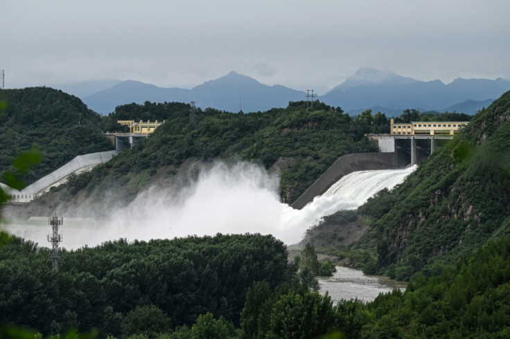 Water is discharged from Miyun reservoir after heavy rains in Miyun district on the outskirts of Beijing on July 28, 2025