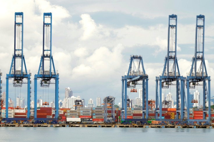 Cranes and containers are seen along the Panama Canal. Hong Kong conglomerate CK Hutchison said it was considering inviting a Chinese "major strategic investor" to join a US-led consortium negotiating the sale of its global ports business, including opera