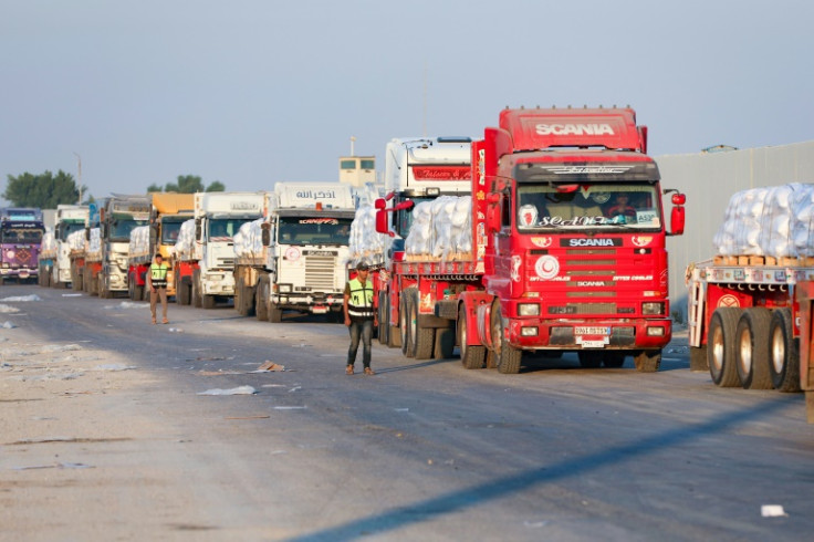 Trucks have begun to arrive at Israel's border crossings into Gaza but aid agencies complain of delays to authorisations and Israel accuses the UN of failing to move quickly enough to distribute the deliveries
