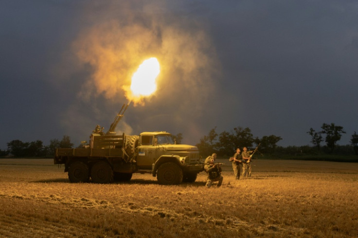Ukrainian servicemen fire a Soviet made ZU-23 anti-aircraft twin autocannon towards a Russian drone during an air attack near Pavlograd