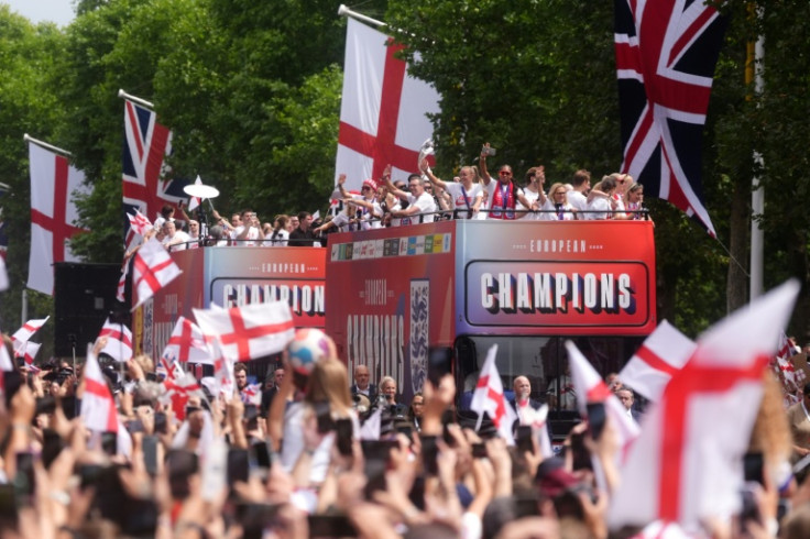 England's Lionesses celebrate their Euro 2025 triumph during a bus parade in London