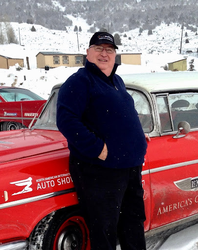 Steve Purdy Leaning Against a 1957 Chevy Nomad
