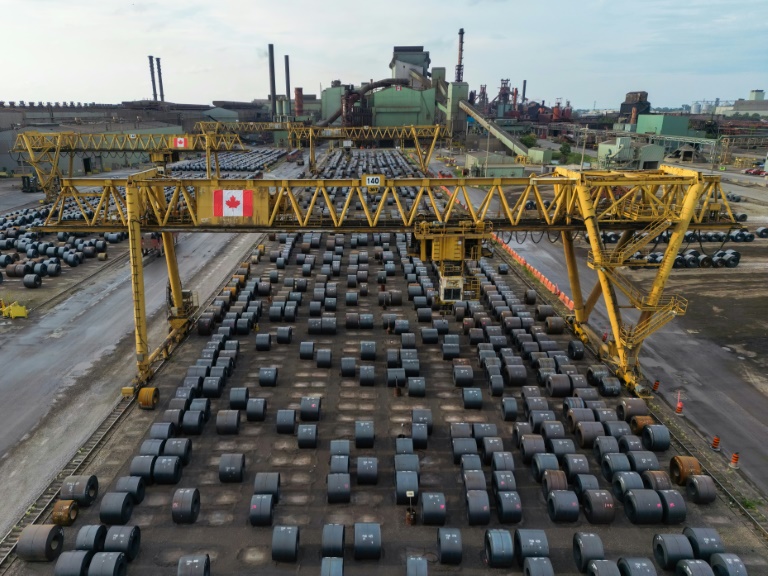 https://d.ibtimes.com/en/full/4613845/steel-coils-sitting-yard-arcelormittal-dofascos-steel-mill-hamilton-canada-which-now-face-50.jpg