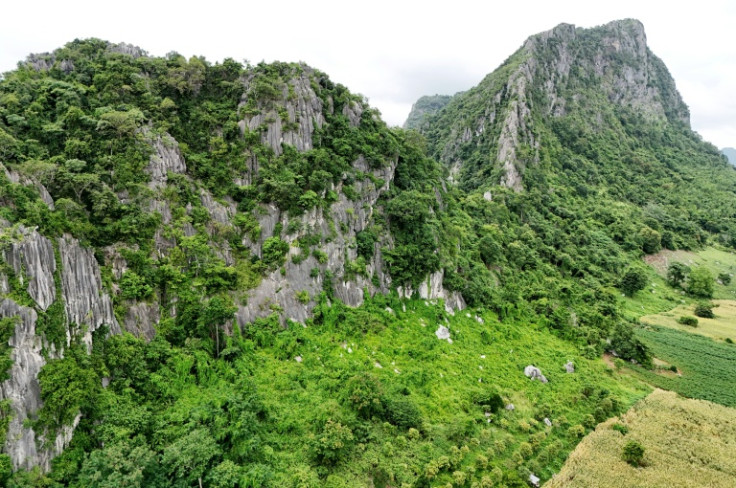 Karst landscapes are ancient structures, formed millions of years ago from coral, and rain erosion creates their characteristic fluted, pockmarked exteriors and vast interior caves and tunnels