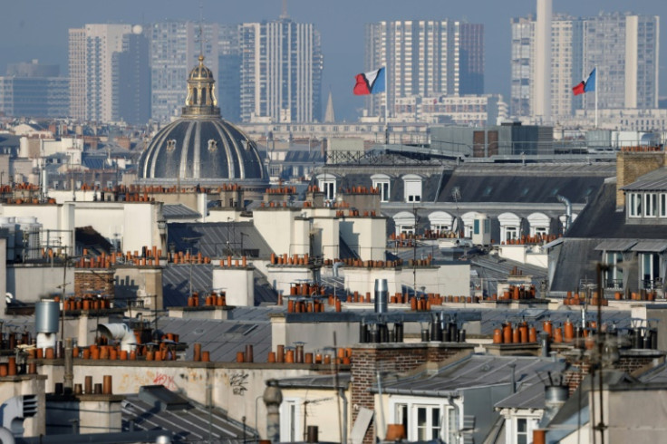 The traditional zinc roofs in Paris do nothing for insulation from the heat