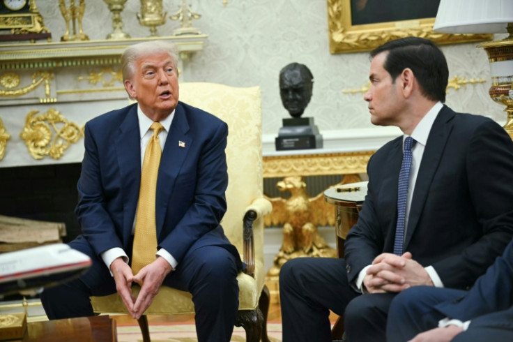 US President Donald Trump (L) speaks as US Secretary of State Marco Rubio looks on during a meeting with Filipino President Ferdinand Marcos Jr. on July 22, 2025