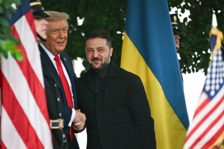 Ukrainian President Volodymyr Zelensky is greeted by US President Donald Trump (L) upon arrival at the White House West Wing in Washington, DC, on August 18, 2025.