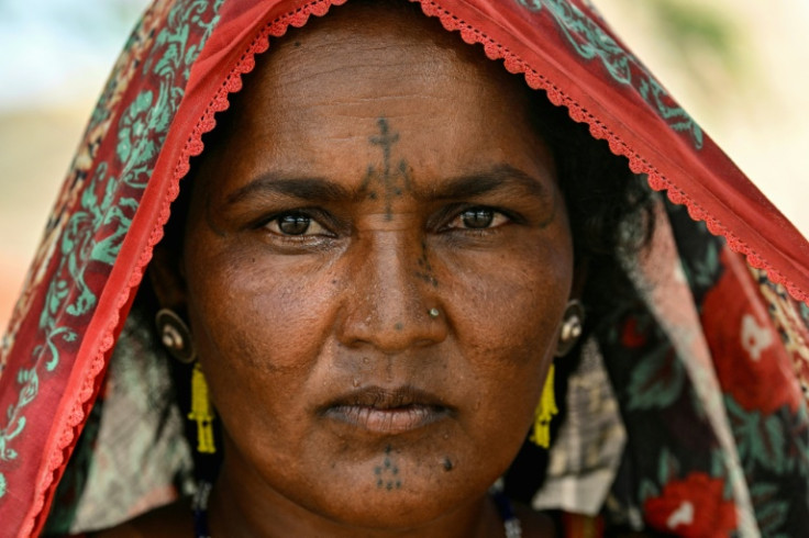 Aklan Jogi shows off her tattoos -- a dying art in a Hindu-majority district of Pakistan