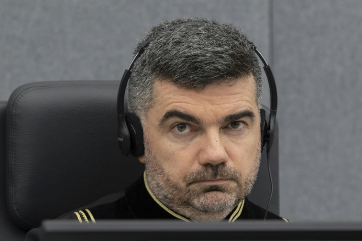 Judge Nicolas Guillou opens a court session on Kosovo in The Hague in November 2020