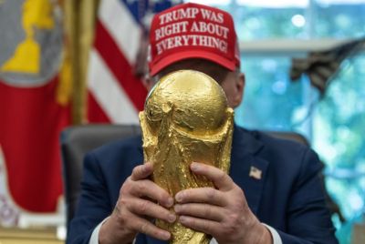 US President Donald Trump holds the World Cup trophy -- he announced the 2026 World Cup draw will be held on December 5, 2025 at Washington's Kennedy Center
