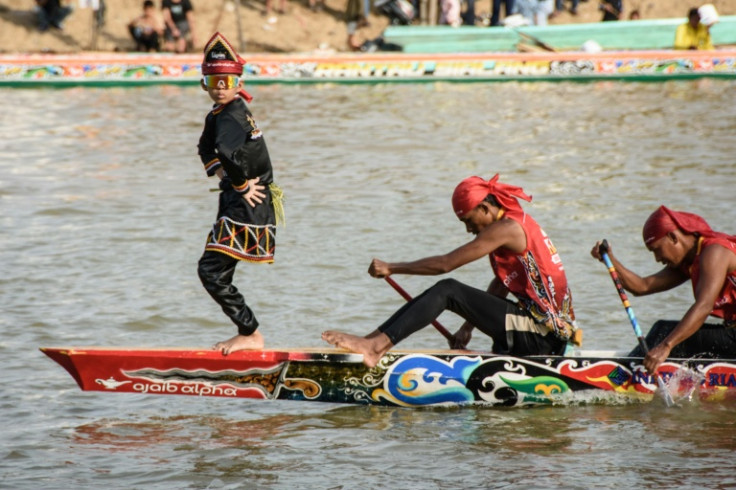 Rayyan Arkan Dikha, an 11-year-old boy who went viral for his calm dance on the bow of a traditional longboat, performs during the Pacu Jalur race festival