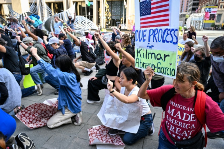 Protestors outside the building where Salvadoran migrant Kilmar Abrego Garcia was arrested by ICE