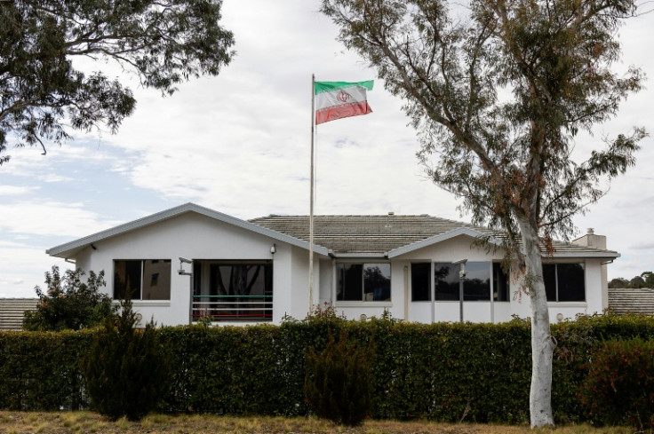 The Iranian national flag flies over the Iranian embassy building in Canberra on August 26, 2025