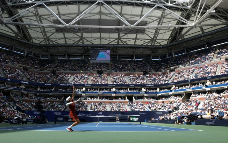 Jannik Sinner serves on his way to a lopsided US Open first round win over Czech Vit Kopriva