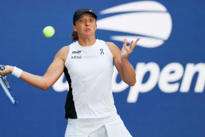 Poland's Iga Swiatek returns during her first round defeat of Colombia's Emiliana Arango at the US Open