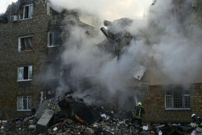 The attack -- one of the deadliest on Kyiv -- blasted a five-storey crater in one apartment block, ripping the building in two
