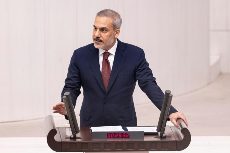 Turkish Foreign Minister Hakan Fidan addresses parliament during a special session on Gaza