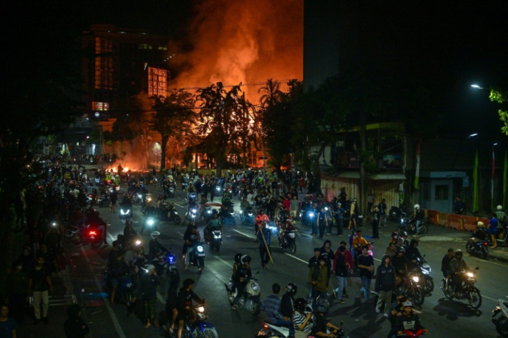 Southeast Asia's biggest economy was rocked by protests in major cities after footage spread of a motorcycle taxi driver being run over