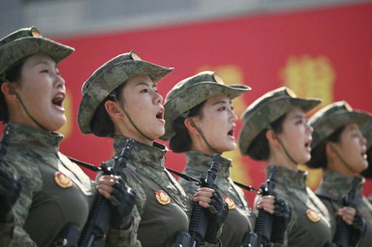 Chinese military personnel take part in a rehearsal ahead of a vast parade on September 3 in Beijing