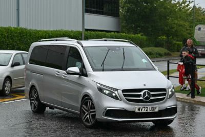 A vehicle believed to be carrying Sweden striker Alexander Isak arrives at Liverpool's training ground