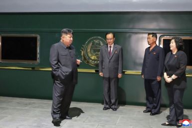 This picture taken on September 1, 2025 and released from North Korea's official Korean Central News Agency via KNS shows Kim outside his train