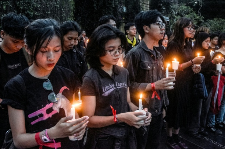 Pink has become one of the colours adopted by protesters in Indonesia for the colour of a hijab worn by a woman who defied police outside parliament