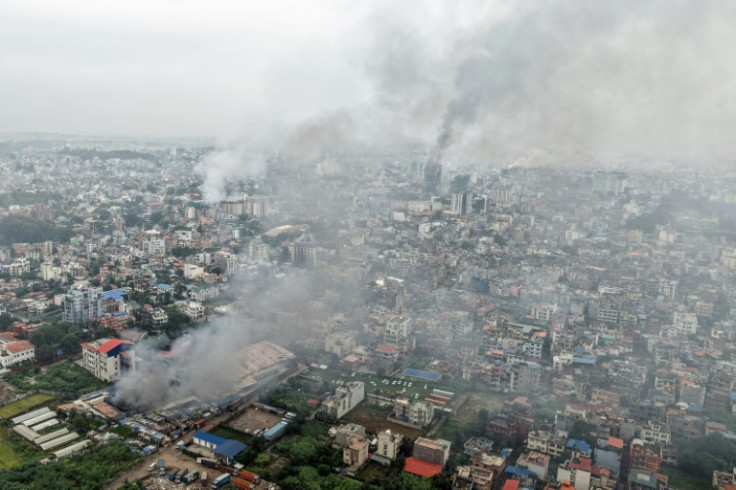 In an outpouring of rage, demonstrators in Nepal torched government offices and a major hotel