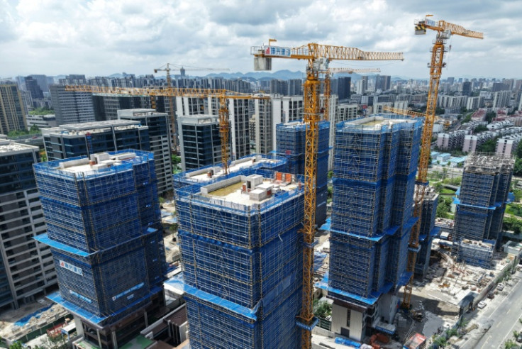 Buildings under construction in Hangzhou, in China’s eastern Zhejiang province. Beijing has struggled to fully reignite the world's number two economy since the end of the Covid-19 pandemic, with the once-booming property sector mired in a debt crisis and