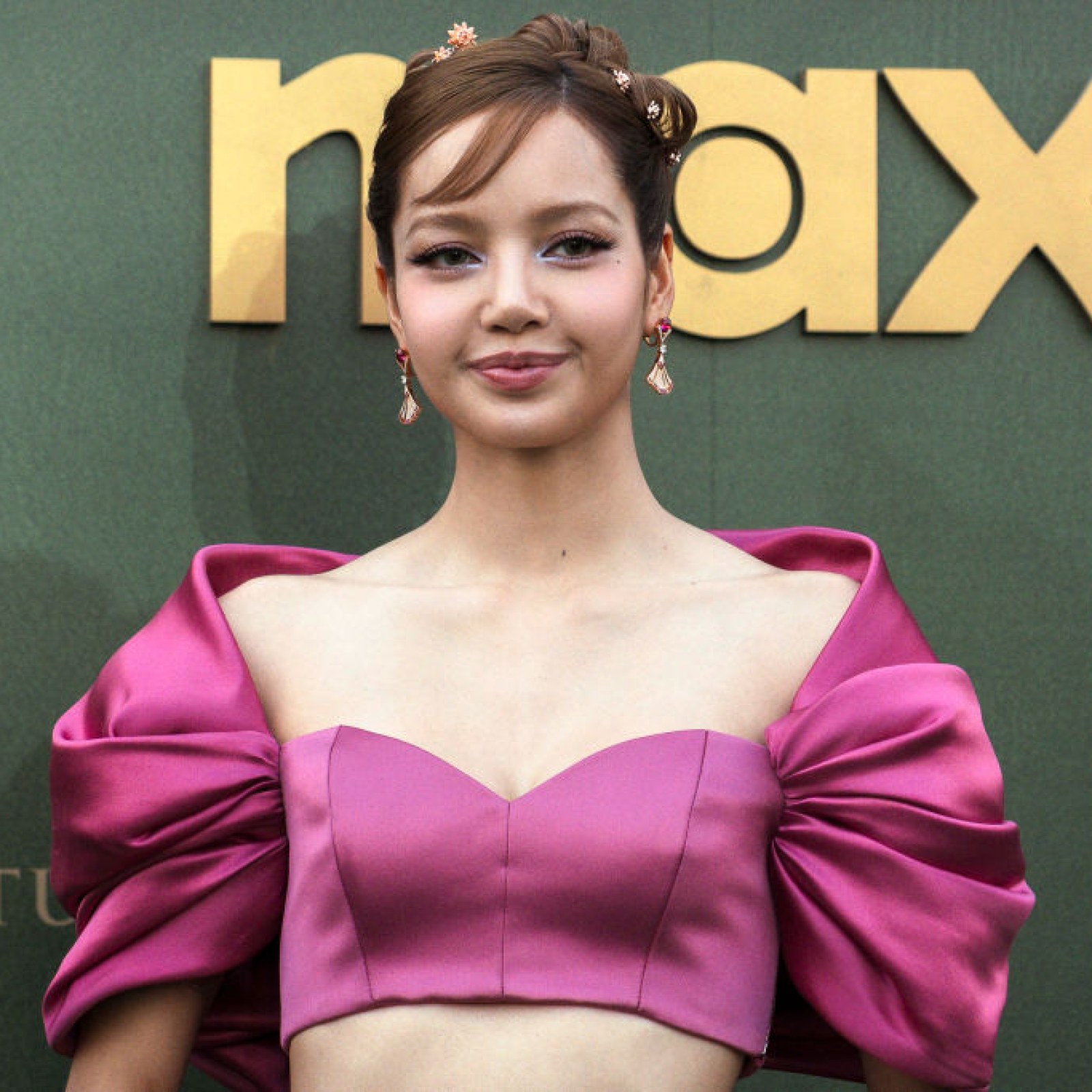 lisa blackpink pink dress PRETTY IN PINK LOOK: Blackpink's LISA captivated her fans as she shared photos of her stunning look in a swirling pink gown at the Emmy Awards. "First Emmys experience with my