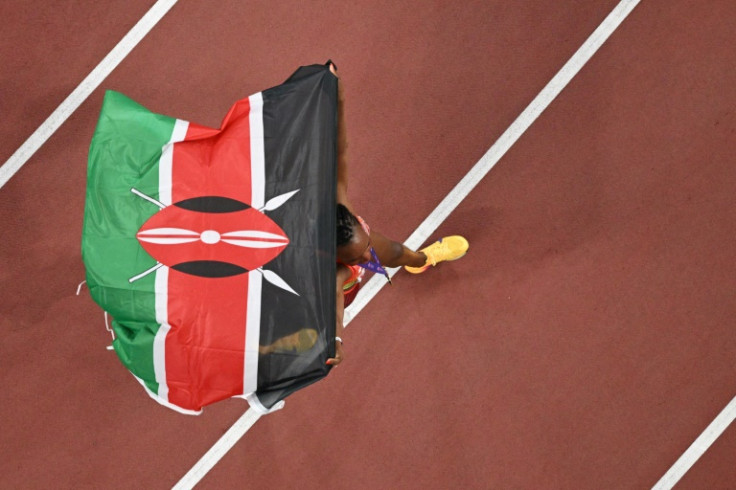 Kenya's double gold medallist Beatrice Chebet celebrates at the world championships in Tokyo -- she has never failed an anti-doping test but questions are being asked about her country's practices