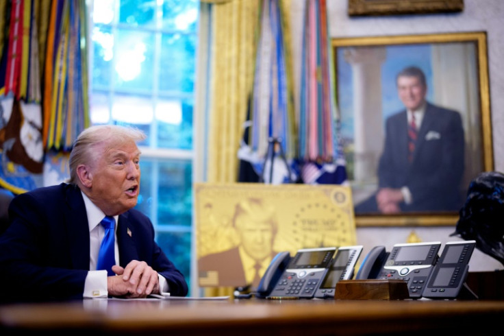 US President Donald Trump speaks in the Oval Office at the White House before signing executive orders that included one introducing a $100,000 fee for H-1B visas