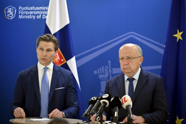 EU defence commissioner Andrius Kubilius (R) and Finnish Defence Minister Antti Haekkaenen addressed the media after a meeting on creating a anti-drone 'wall' to protect the EU's eastern states