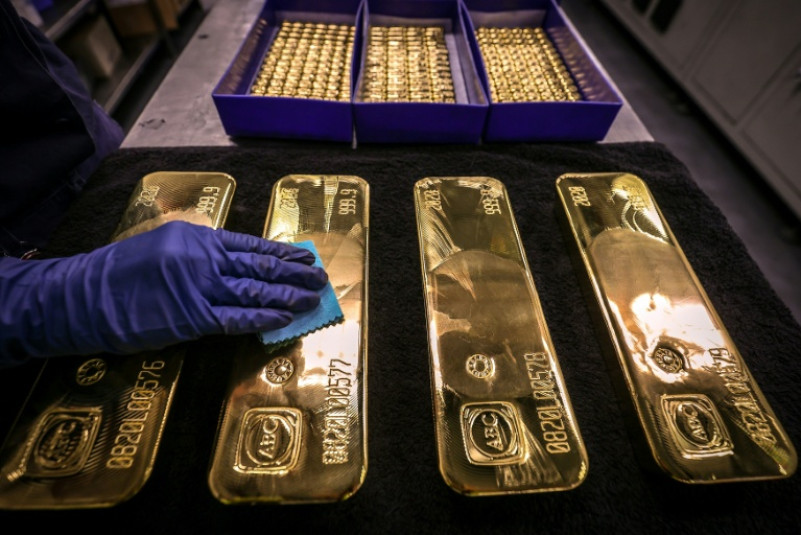 Gold prices have hit a record high and are just short of the $4,000 mark