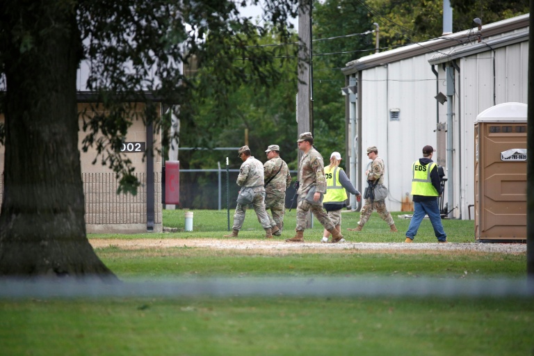 https://d.ibtimes.com/en/full/4626796/texas-army-national-guard-troops-are-seen-military-facility-elwood-illinois-october-7-2025.jpg