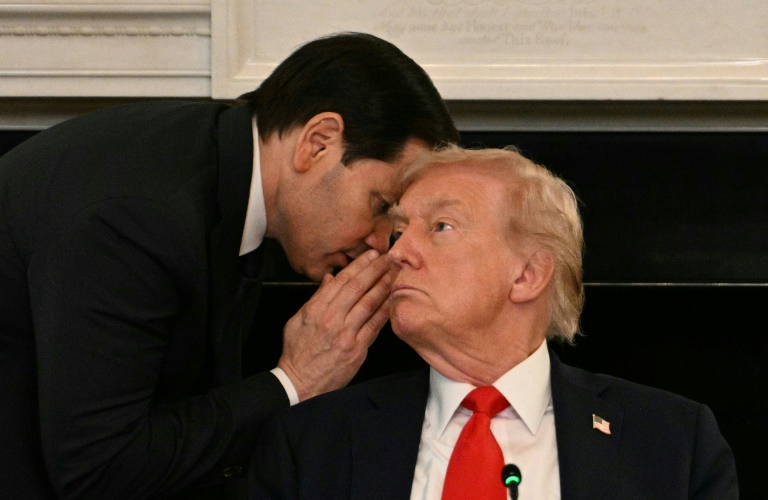 https://d.ibtimes.com/en/full/4627190/us-secretary-state-marco-rubio-whispers-ear-president-donald-trump.jpg
