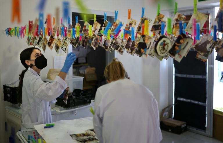 After Deadly Floods, Spaniards Fight To Save Photos