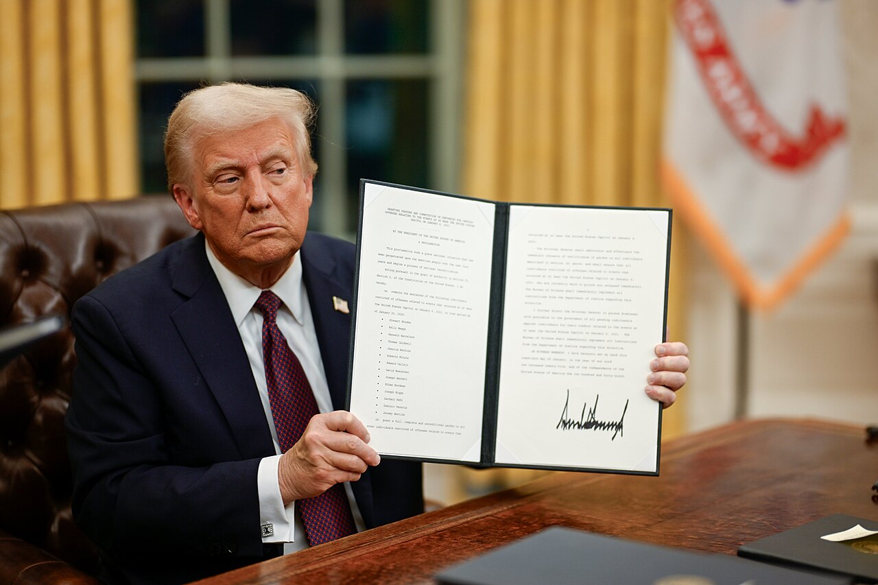 https://d.ibtimes.com/en/full/4635005/trump-holding-presidential-proclamation-he-signed.jpg