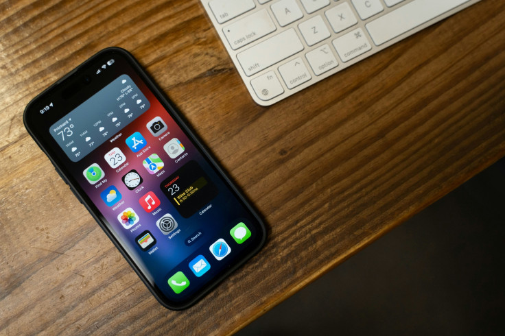 iPhone on Top of a Wooden Table