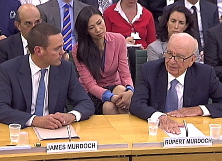 James Murdoch and Rupert Murdoch appear before a parliamentary committee 