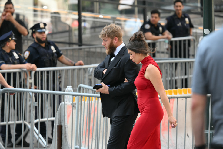 US professional football player Cooper Kupp (L) and wife Anna